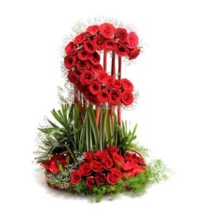 moon shaped arrangement of 50 red roses